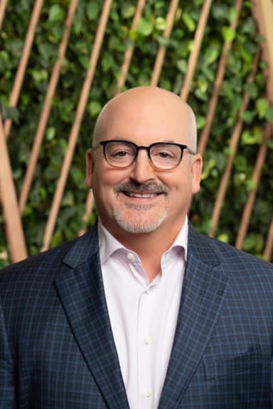 Portrait of Michael Watson, Chief Customer Officer at WM